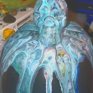 Ceramic pumpkin skull with a paint pour on top